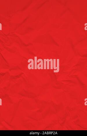 Red crumpled wrinkled textured paper background. Empty space Stock Photo