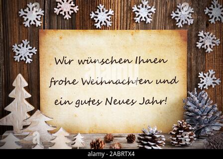 Old Paper With German Text Frohe Weihnachten Und Ein Gutes Neues Jahr Means Merry Christmas And A Happy New Year. Christmas Decoration Like Tree, Fir
