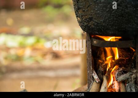 Villagers cooking in the morning using firewood Stock Photo