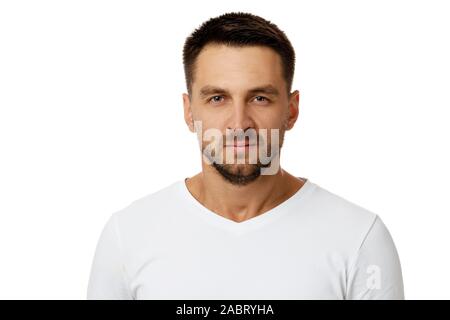 Portrait of young frowned handsome bearded man on white background. facial expression Stock Photo