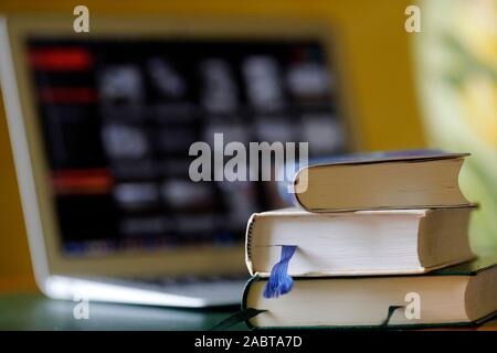 Bibles and laptop on a table.  France. Stock Photo