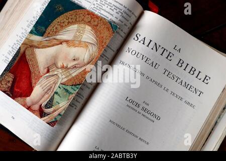 Open old bible. Religious image of the Holy Virgin.  France. Stock Photo