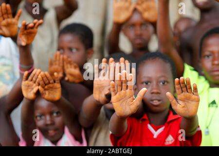 Group of children showing their hands, Datcha-Attikpaye, Togo, West ...