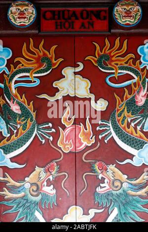Drawings of dragons at the entrance to the 17th-century Chinese Quan Cong Temple.  Hoi An. Vietnam. Stock Photo