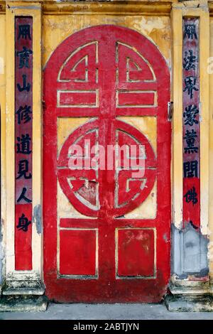 Taoist temple.  Red chinese door. Taoist temple.  Hanoi. Vietnam. Stock Photo