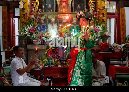 Mau Son taoist temple.  Woman at taoist ceremony. Ritual of offerings.  Sapa. Vietnam. Stock Photo