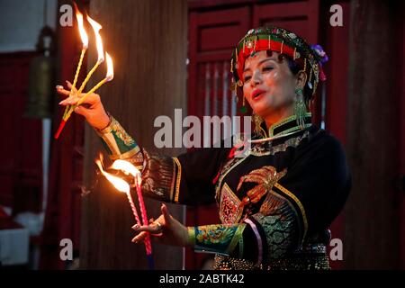 Mau Son taoist temple.  Woman at taoist ceremony. Ritual of offerings.  Sapa. Vietnam. Stock Photo