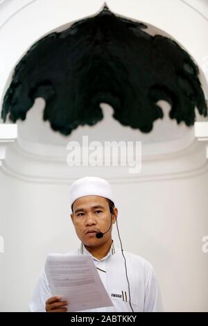 The friday prayer (jummah). Imam  giving the sermon ( Khutbah).  Masjid Al Noor mosque.  Hanoi. Vietnam. Stock Photo