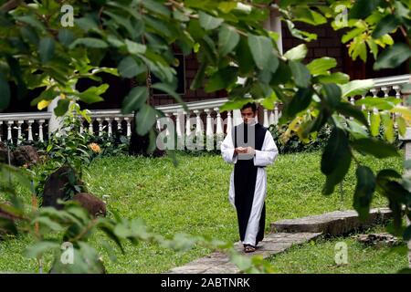 Cistercian Abbey.  Our Lady of My Ca.  Monk in the garden.  Vietnam. Stock Photo