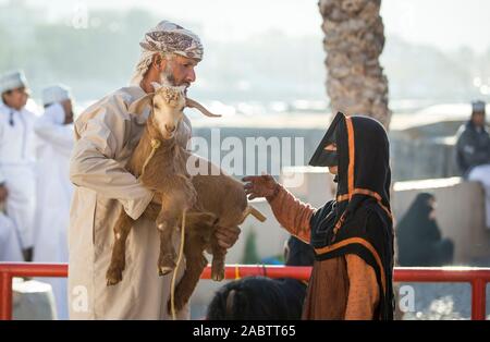 Nizwa, Oman, December 2015: omani man  at the old Nizwa goat market Stock Photo