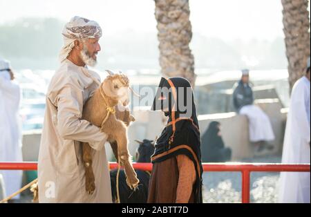 Nizwa, Oman, December 2015: omani man  at the old Nizwa goat market Stock Photo