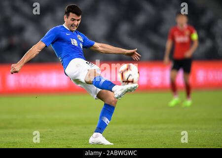 English-born Taiwanese football player Tim Chow of Henan Jianye F.C. plays during the 29th round match of Chinese Football Association Super League (CSL) against Shenzhen F.C. in Shenzhen city, south China's Guangdong province, 27 November 2019. Shenzhen F.C. tied the game with Henan Jianye with 3-3. Stock Photo