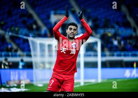 Brazilian football player Alan Douglas Borges de Carvalho, simply known as Alan, of Tianjin Tianhai F.C. celebrates after scoring during the 29th round match of Chinese Football Association Super League (CSL) against Dalian Yifang in Tianjin, China, 27 November 2019. Tianjin Tianhai slashed Dalian Yifang with 5-1. Stock Photo