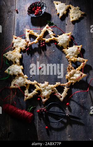 Cookie wreath on a wooden table.Christmas decoration.Delicious food and drink.Low fat Stock Photo