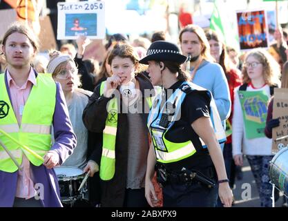 Southampton, UK. 29th November 2019. Extinction Rebellion campaigners march through Southampton's shopping precinct on Black Friday as part of the Global Climate Change Strike. Credit Stuart Martin/Alamy Live News Stock Photo