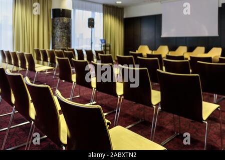 Empty conference hall with many chairs Stock Photo