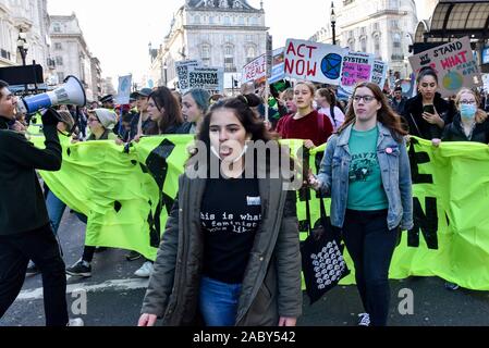 Piccadilly Circus, London, UK. 29th Nov, 2019. Yong people and school children taking part in the Youth Strike 4 Climate protests in London. Credit: Matthew Chattle/Alamy Live News Stock Photo