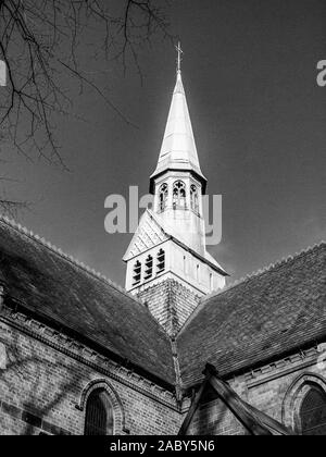 Church spire of St Michael's church in black & white, Coppenhall Crewe Cheshire UK Stock Photo