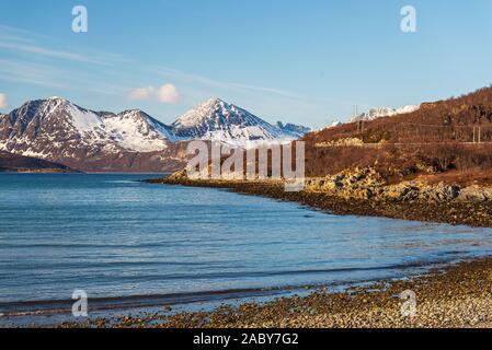 sunset over sandvika beach in Tromso region during a spring afternoon, Norway Stock Photo