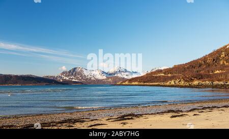 sunset over sandvika beach in Tromso region during a spring afternoon, Norway Stock Photo