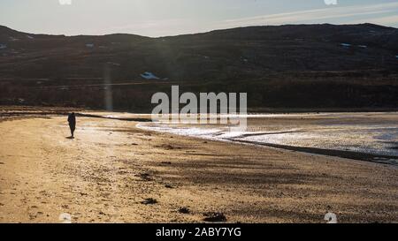 sunset over sandvika beach in Tromso region during a spring afternoon, Norway Stock Photo