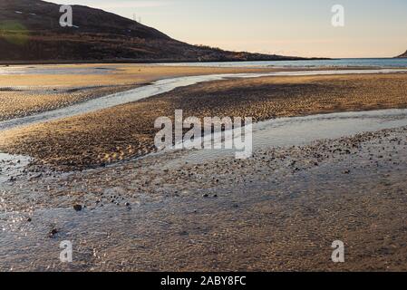 sunset over sandvika beach in Tromso region during a spring afternoon, Norway Stock Photo