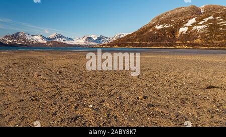 sunset over sandvika beach in Tromso region during a spring afternoon, Norway Stock Photo