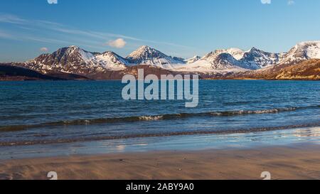 sunset over sandvika beach in Tromso region during a spring afternoon, Norway Stock Photo