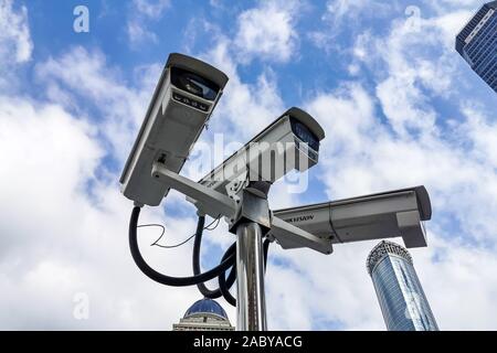 Hikvision surveillance cameras are seen on the ring overpass near the Oriental Pearl TV Tower in the Lujiazui Financial District in Pudong, Shanghai, Stock Photo