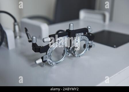 Ophthalmic glasses laying on the white table in the clinic Stock Photo