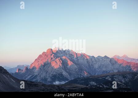 Mountain filled with sun rays from the left side. Beautiful and quiet place Stock Photo