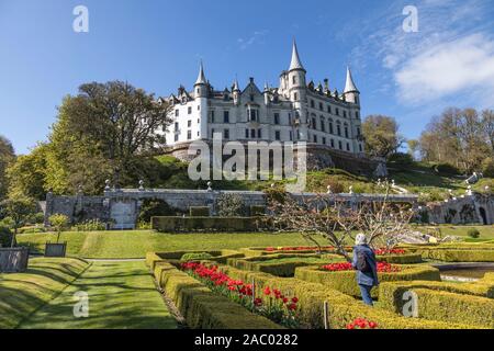View of the rear facade of Dunrobin Castle with the gardens in the foreground. The original castle was remodelled in 1845 by Sir Charles Barry changin Stock Photo
