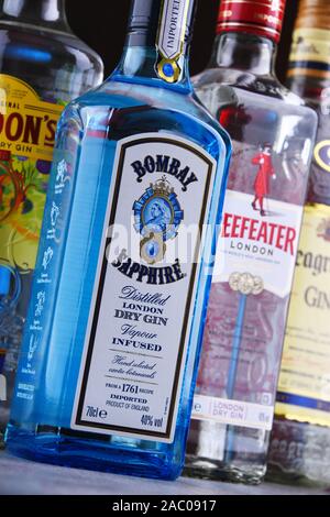 POZNAN, POLAND - OCT 23, 2019: Four bottles of popular global gin brands: Gordons, Beefeater, Seagram and Bombay Sapphire Stock Photo