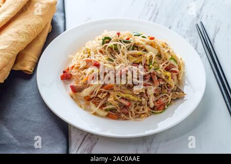 Chinese pork mei fun also known as Singapore-style noodles Stock Photo