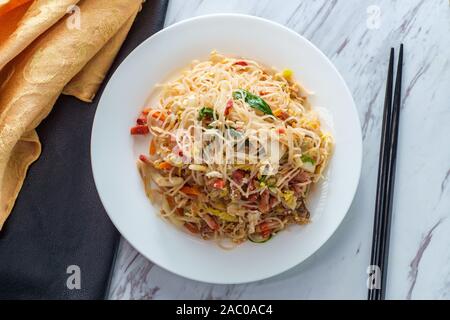 Chinese pork mei fun also known as Singapore-style noodles Stock Photo
