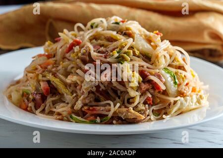 Chinese pork mei fun also known as Singapore-style noodles Stock Photo