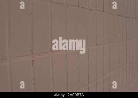 Brown Vintage Ceramic Tiles. Tile brown. The texture of the wall. Stock Photo