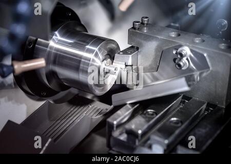 Metal cutting and forming using CNC machines, high precision technology in the machinery industry. Stock Photo
