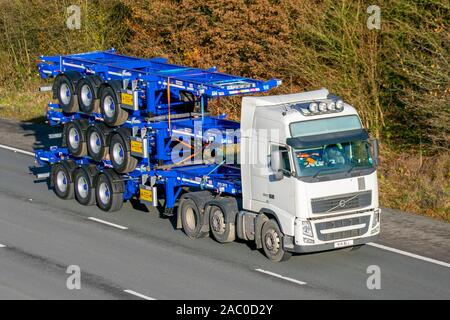 Haulage delivery trucks, articulated lorry, transportation, truck, cargo carrier, Volvo vehicle, European commercial transport, industry, M61 at Manchester, UK Stock Photo