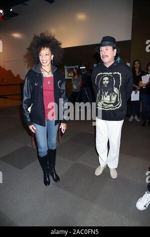 CARLOS SANTANA Joins Local Students As They Drum And Dance To The Beats Of The World Discovery Children's Museum  Las Vegas, Nv  October 29, 2019  Featuring: Carlos Santana, Cindy Blackman Santana Where: Las Vegas, Nevada, United States When: 29 Oct 2019 Credit: DJDM/WENN.com Stock Photo