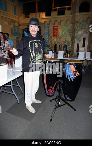 CARLOS SANTANA Joins Local Students As They Drum And Dance To The Beats Of The World Discovery Children's Museum  Las Vegas, Nv  October 29, 2019  Featuring: Carlos Santana Where: Las Vegas, Nevada, United States When: 29 Oct 2019 Credit: DJDM/WENN.com Stock Photo