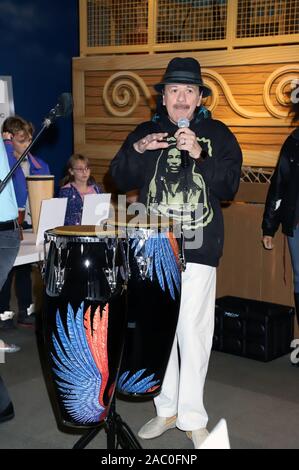 CARLOS SANTANA Joins Local Students As They Drum And Dance To The Beats Of The World Discovery Children's Museum  Las Vegas, Nv  October 29, 2019  Featuring: Carlos Santana Where: Las Vegas, Nevada, United States When: 29 Oct 2019 Credit: DJDM/WENN.com Stock Photo