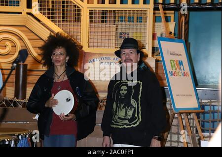 CARLOS SANTANA Joins Local Students As They Drum And Dance To The Beats Of The World Discovery Children's Museum  Las Vegas, Nv  October 29, 2019  Featuring: Carlos Santana, Cindy Blackman Santana Where: Las Vegas, Nevada, United States When: 29 Oct 2019 Credit: DJDM/WENN.com Stock Photo