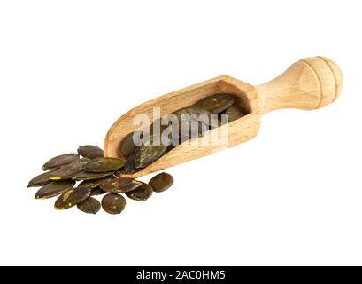Serving scoop with pumpkin seeds isolated on white Stock Photo