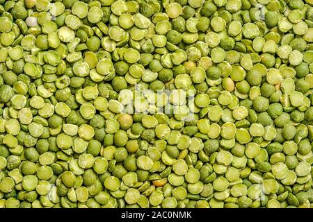 Full-screen image of green split peas Stock Photo