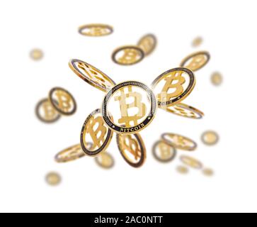 Gold cryptocoin Bitcoin explosion. Isolated on white Stock Photo