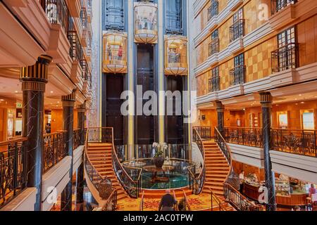 Taken on board the Norwegian Spirit cruise ship on one of the shopping and cafe decks and Atrium. Stock Photo