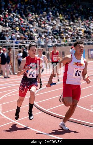 High School boys 4x400runners competing at the 2019 Penn Relay . Stock Photo