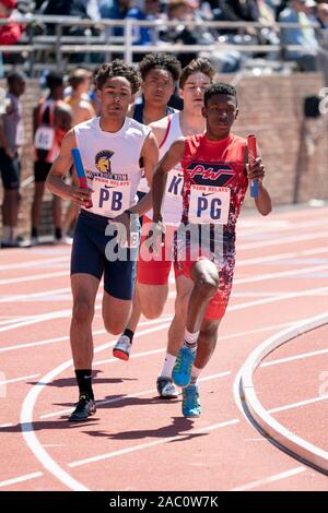 High School boys 4x400runners competing at the 2019 Penn Relay . Stock Photo