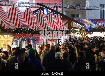 Berlin, Germany. 29th Nov, 2019. People visit the Christmas market on Alexanderplatz in Berlin, Germany, on Nov. 29, 2019. Credit: Shan Yuqi/Xinhua/Alamy Live News Stock Photo